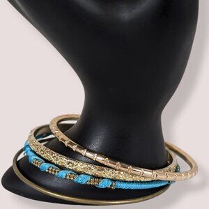 Set of 4 Gold Tone Bangles